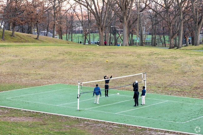 Come for volleyball game with friends in West Hudson Park in Harrison, NJ.