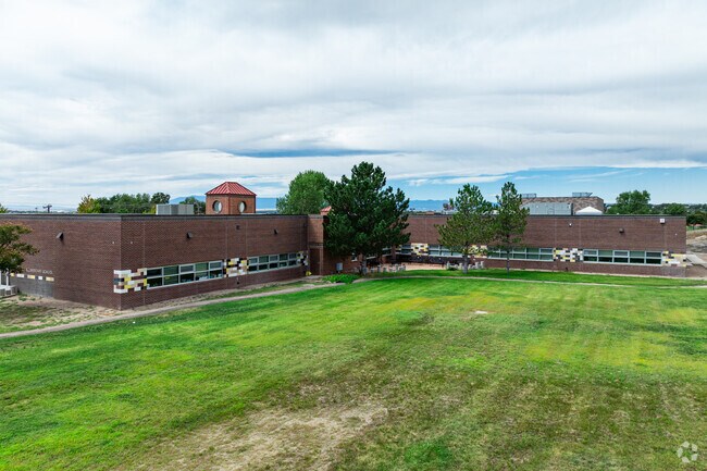 Baca Elementary School has a large lawn in the back for recess.