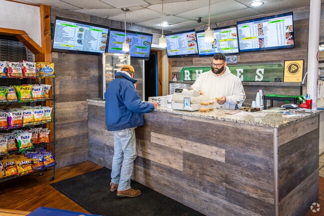 Satisfy your pizza cravings at Rhodes Pizza and Restaurant in Riverside, a local favorite.