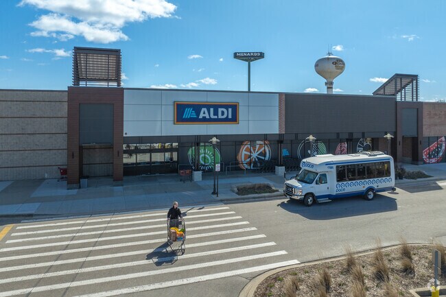 Residents shop for discounted groceries at Aldi.