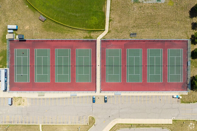 Walled Lake Central High School has eight tennis courts.