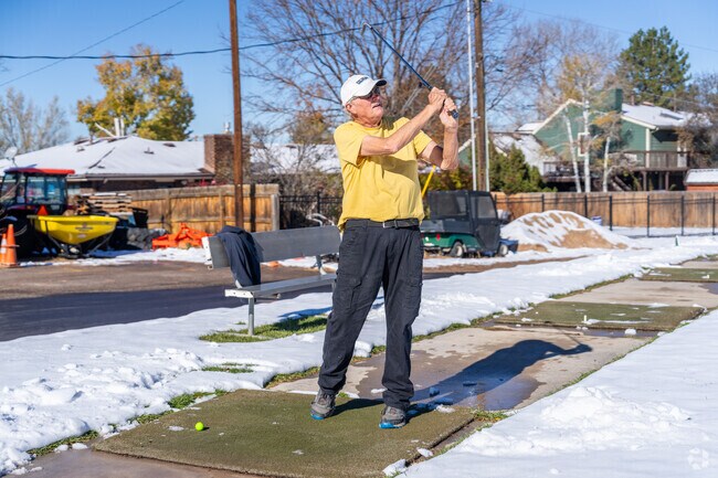 Go to the driving range to practice your stroke at the Highland Hills Golf Course.