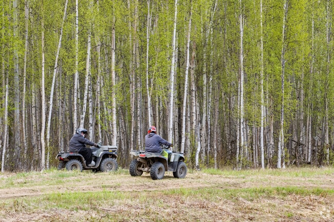 Knik-Fairview residents travel side trails on ATVs and dog sleds in winter.