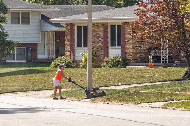 Homeowners of Twin Lakes homes enjoy being out taking care of their yards.