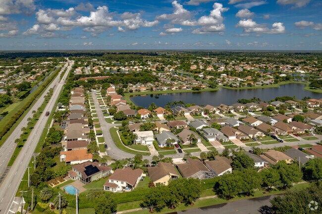 Aerial view of Ranch style homes along Yamato Road in the Whisper Walk neighborhood.