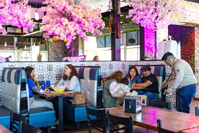 El Azteca offers Open Gates diners authentic Mexican cuisine, full bar, and vibrant atmosphere.