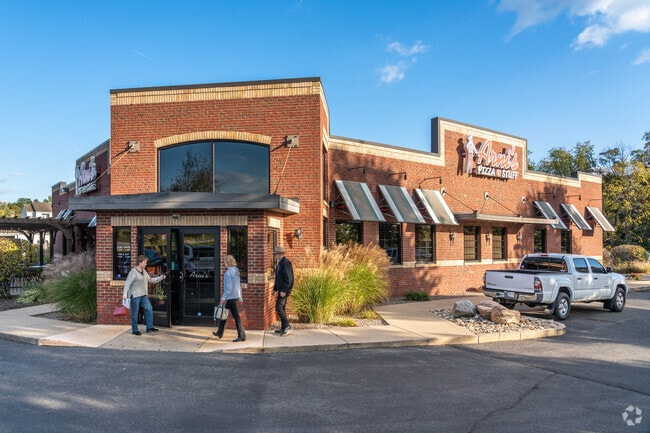 Patrons head into Arni's Restaurant for dinner near Frances-Stones Crossing.