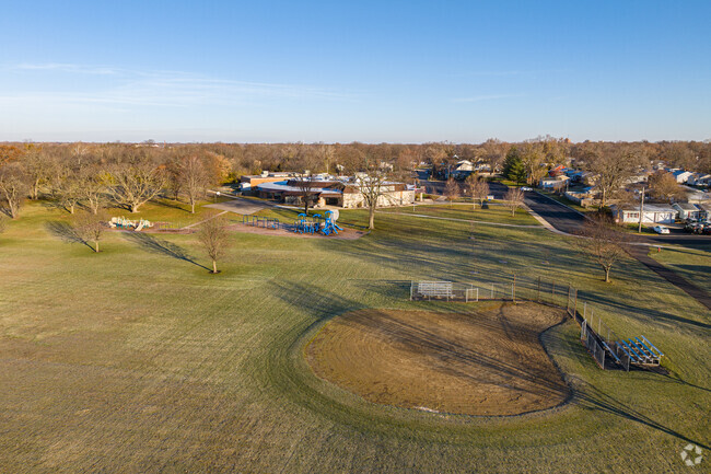 Aurora's Krug Elementary students have access to a number of baseball diamonds.