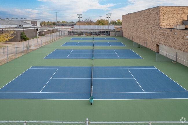 Yukon Middle School has tennis courts on site.