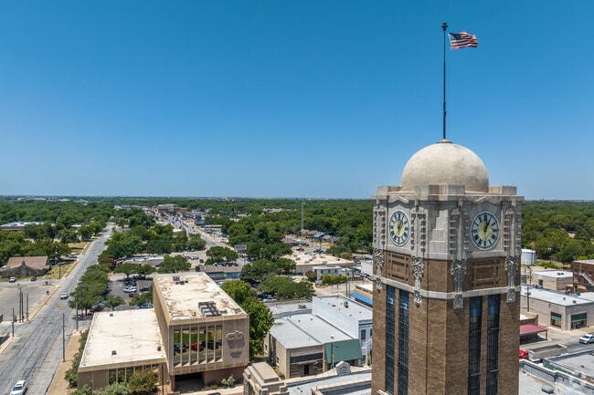 Flags fly high at the Capitol building in Downtown Cleburne.