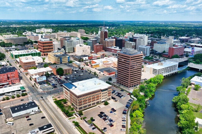 An aerial view of downtown Lansing, just minutes from Greencroft Park.