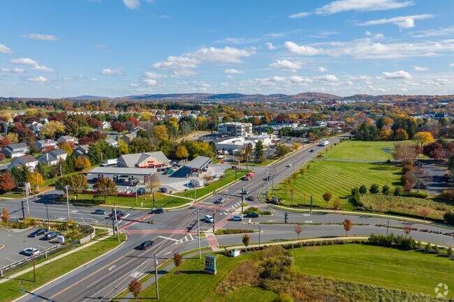 A view down Route 100 shows the scenic open lands of Lower Macungie West.