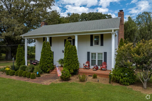 Not as common as other home styles in Hazel Green, some examples of Greek Revival can be seen.