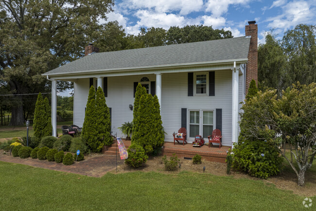 Not as common as other home styles in Hazel Green, some examples of Greek Revival can be seen.
