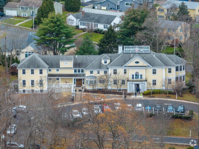 The Adams Montessori School in Quincy, MA is painted a playful yellow.