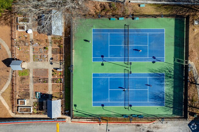 Practice your backswing or plant in the community garden at Downtown Decatur's Scott Park.