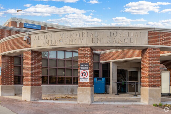 The emergency center of Alton Memorial Hospital was added in the mid 1990's.