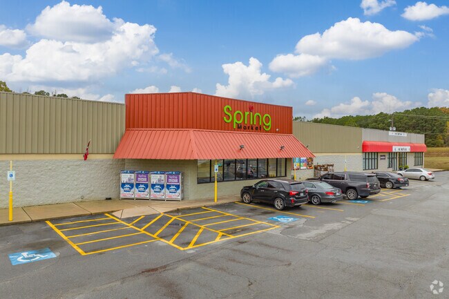 Woodson residents shop for their groceries at nearby Spring market.