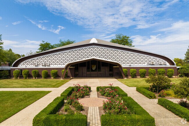 The front entry of Christ Community Church in Central Zion includes a garden and walkway.