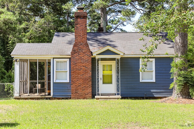 This colorful Eau Claire home adds a nice splash of yellow to compliment its blue clapboards.