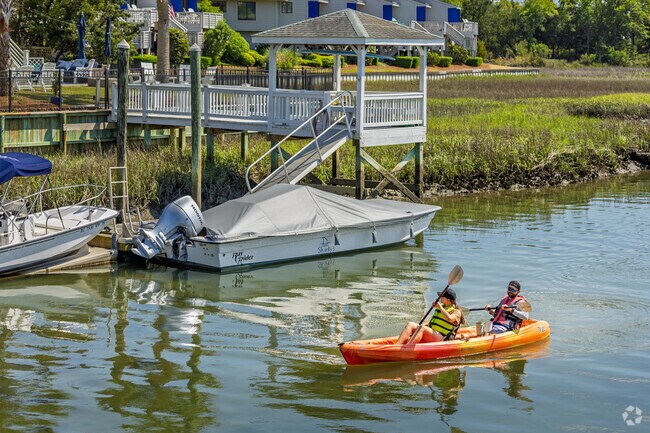 Windemere locals spend their afternoons kayaking around the canals of Wrightsville Beach.