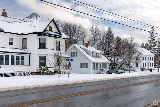 A mix of vintage homes borders a main road in Orrington.