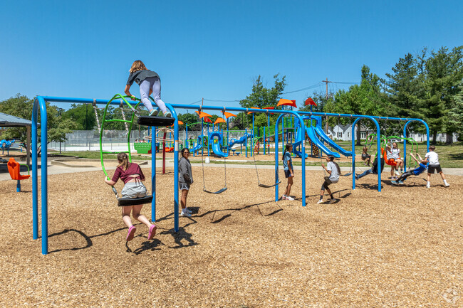 Children play in Moran Park, located in Washington Square in Holland.