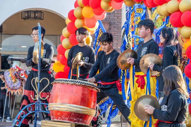 Traditional drummers add a thunderous beat to performances during the Lunar New Year Celebration near Coast District.