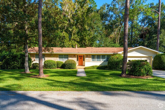 This Sugarfoot home features a meticulously landscaped front yard.