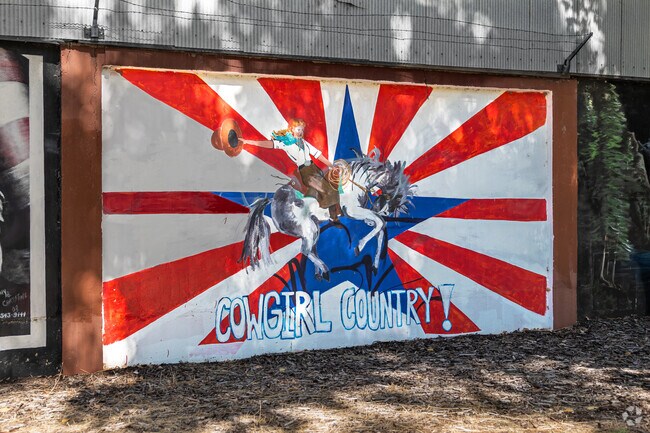 Cowgirl Americana style art found in the neighborhood of Canyon Road.