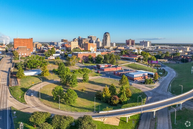 Lush landscaping still softens the skyline in Downtown Riverfront’s public spaces.