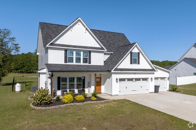 Large modern farmhouse styled homes are popular with families in Grays Creek.
