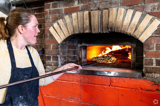 Smoky Mountain Bakers cooks up pizza, muffins, cookies, and other pastries.