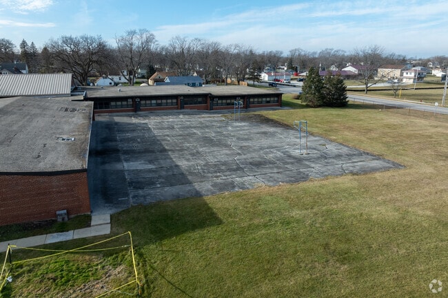 Monee Education Center has a blacktop court to play on.