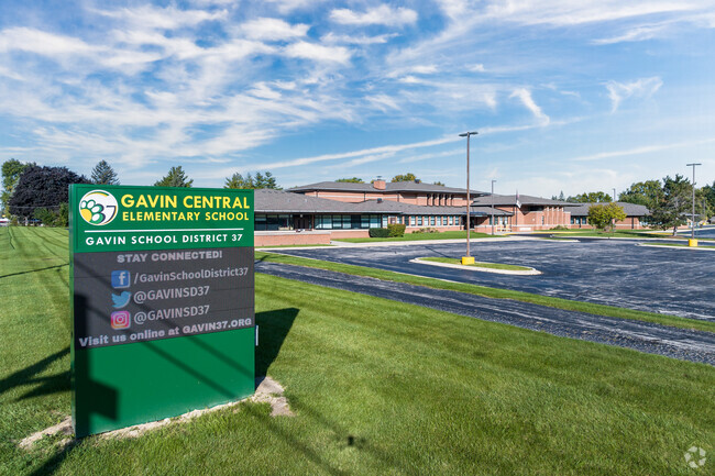 An electronic sign displays contact information in front of Gavin Central Elementary School.