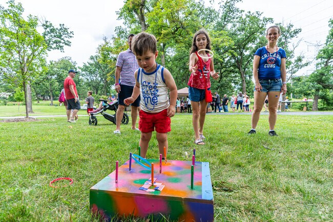 Kids love the games at the Woodridge 4th of July Picnic in Hawthorne Hill Woods.