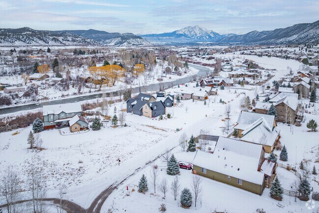 The homes in Cattle Creek boast stunning architecture that blends seamlessly with the natural landscape. Many feature large windows to capture breathtaking mountain views and provide a cozy, inviting atmosphere.