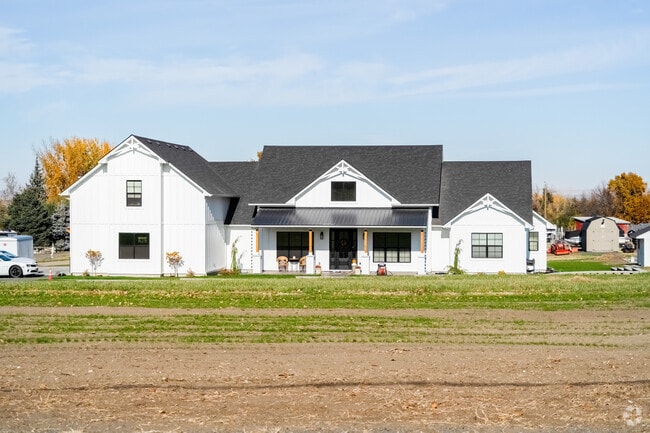 A charming farmhouse sits on a spacious lot in Cold Springs.