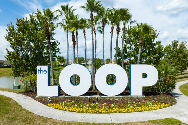 The signage outside of The Loop shopping center at Hunters Creek