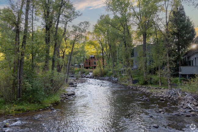 The Roaring Fork River offers fishing, rafting, and scenic views near Snowmass Village.