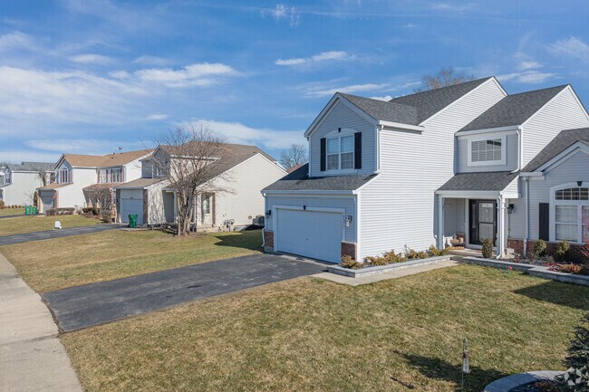 Modern-traditional style homes in South Homer Glen feature front facing gables.