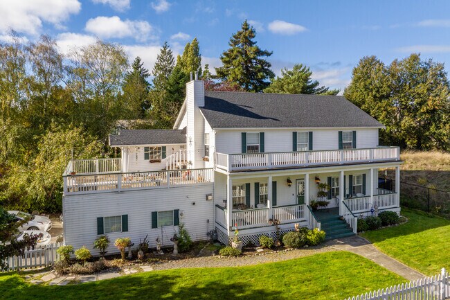 Homes in the Browns Point neighborhood often feature multiple large porches.