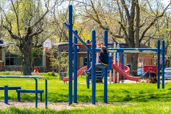 Ainsworth Park residents use the playground at Recreation Park for exercise.