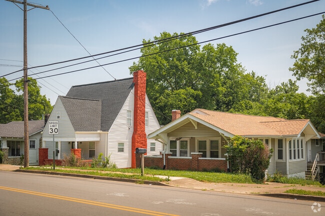 Low porches and stony chimneys adorn Piney Woods homes.