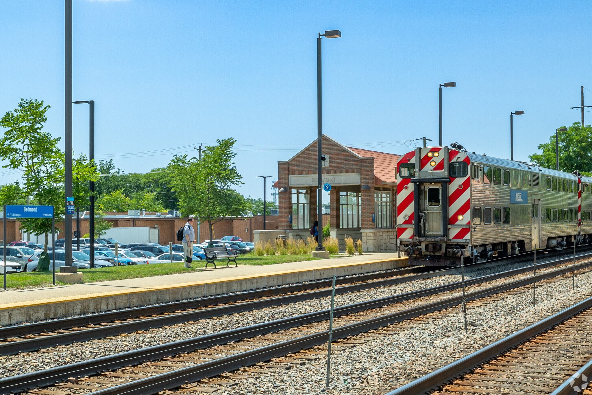 The Metra Belmont station is centrally located and will get you to Chicago in an hour.