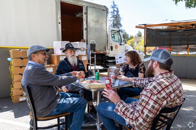 Locals gather on Lakeshore Ave to discuss today's events in Crocker Highlands.