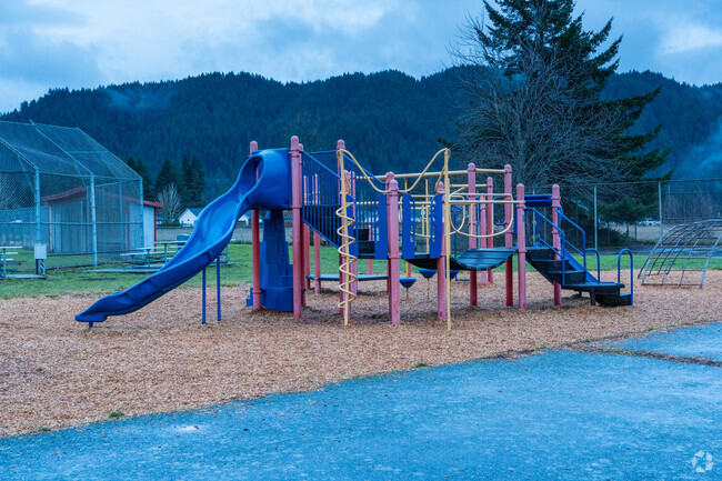 A play structure sits in the playground.