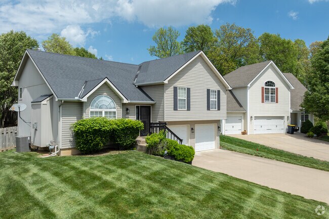 Clayton homes are often accompanied by a large yard and trees.