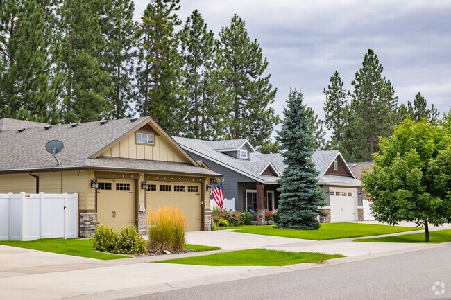 Rows of single family homes with mature trees receive great afternoon shade.