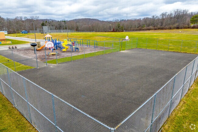 South Buffalo Elementary School has a basketball court in the back of the property.